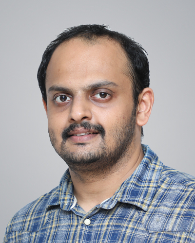 Dr. Arun M