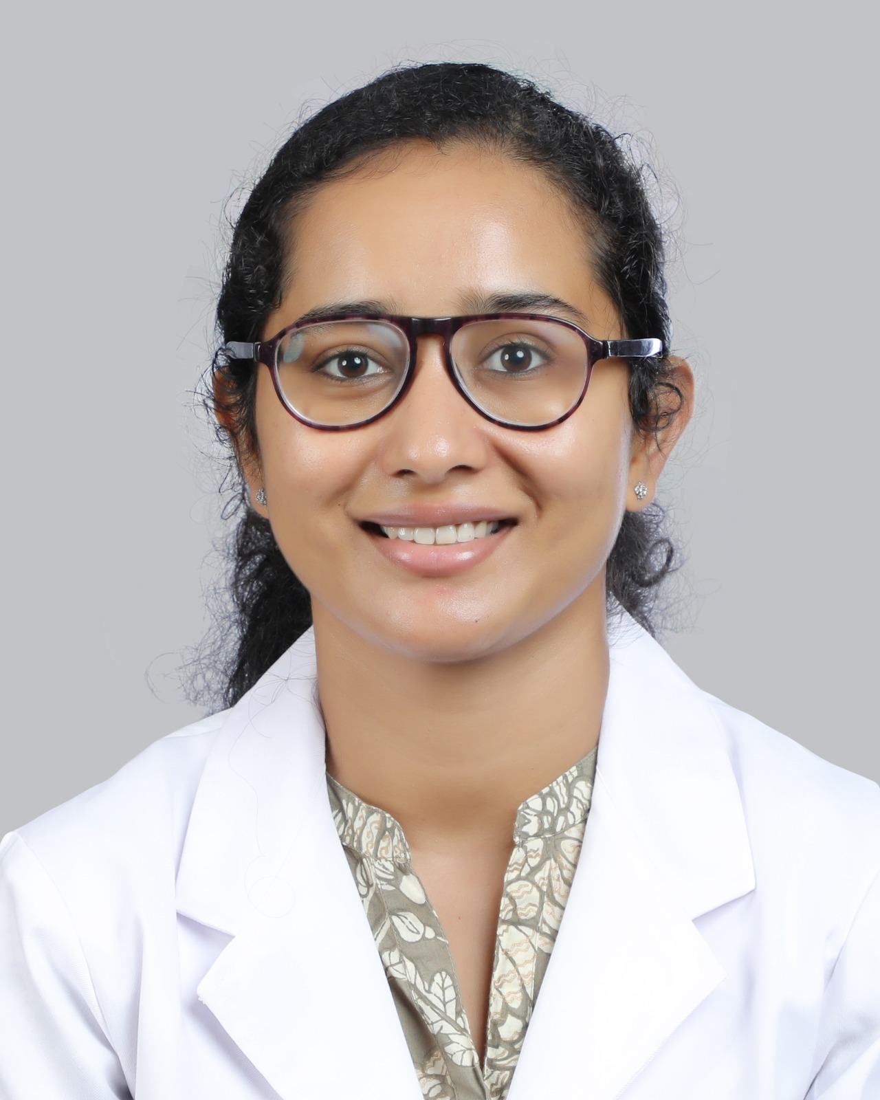 Dr. Dhanya S M