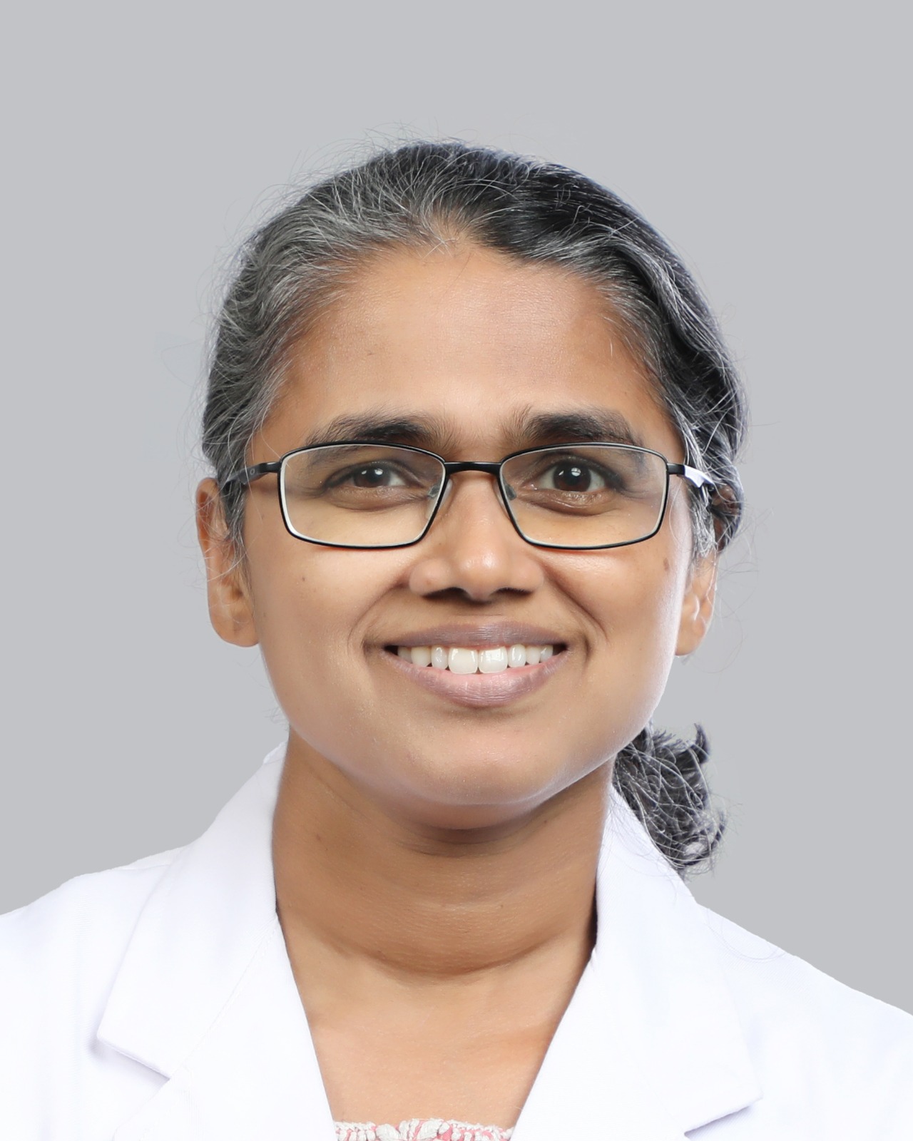 Dr. Preethi Cheriyan - Dermetology