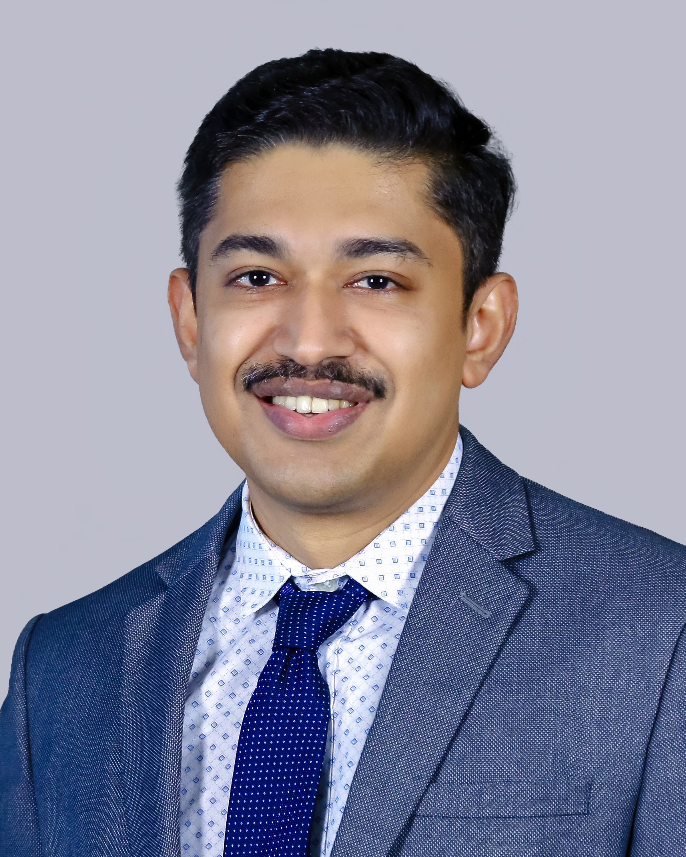 Dr. Akhil M