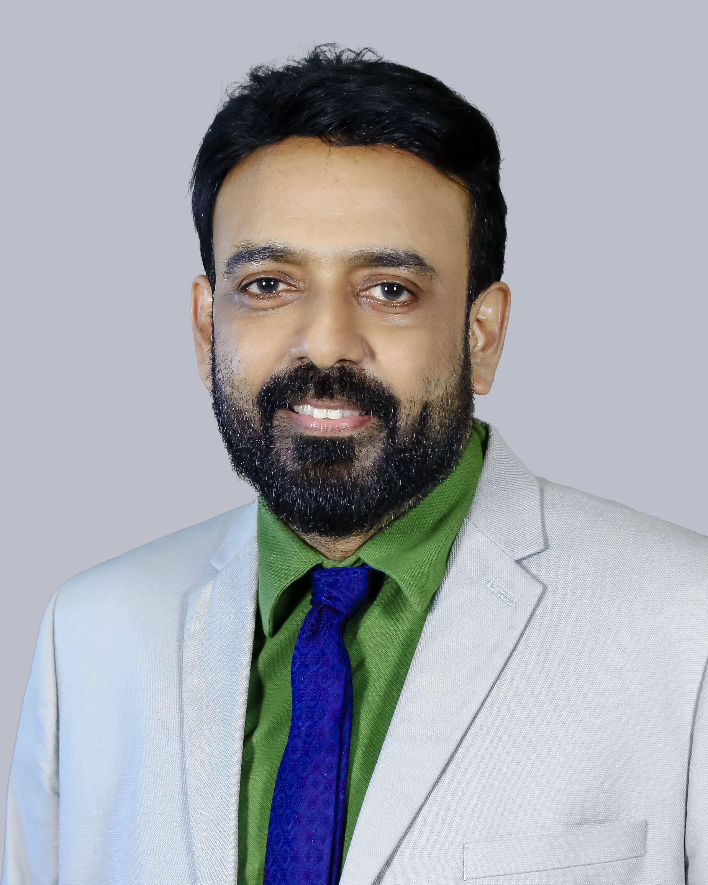 Dr. Anil N X