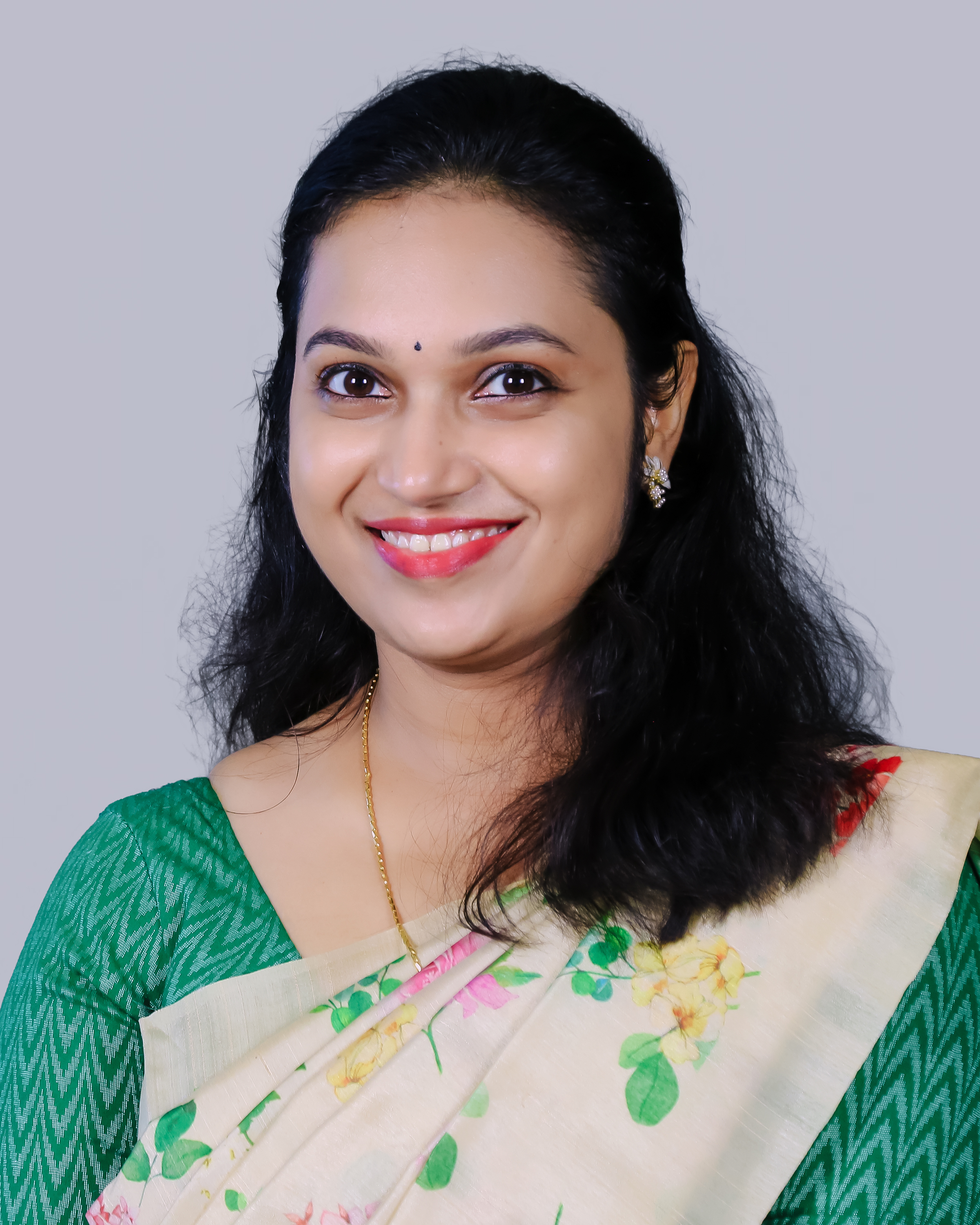 Dr. Nisha M