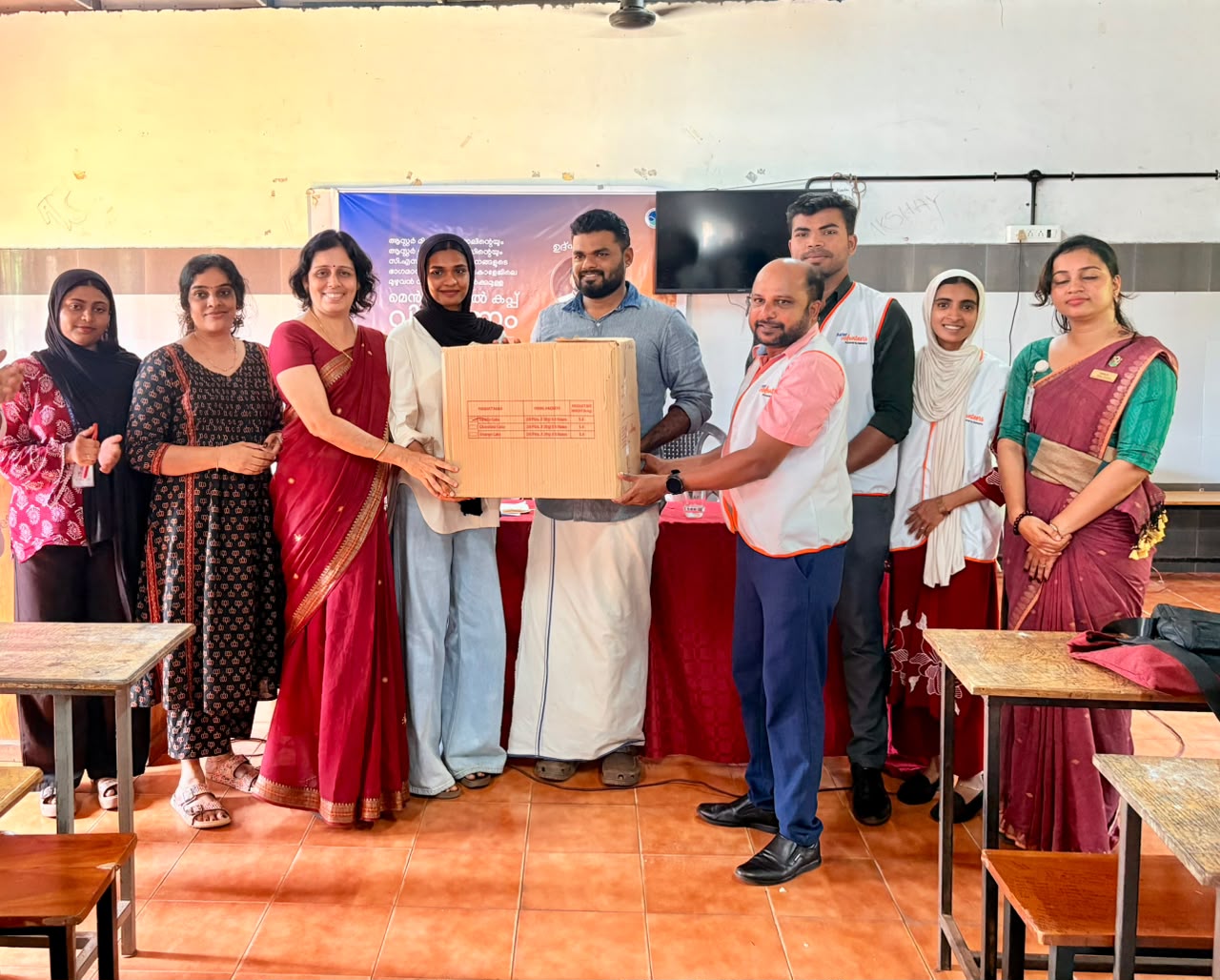 Aster MIMS Kottakkal Distributes Free Menstrual Cups to College Students
