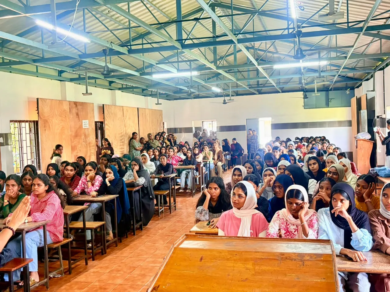 Aster MIMS Kottakkal Distributes Free Menstrual Cups to College Students